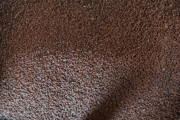 Small granules of crushed wheat close-up. Wheat background