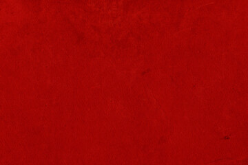 Cardboard red abstract pattern texture close-up. Retro old paper background. Grunge concrete wall. Vintage blank wallpaper.