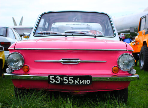 Very hardy and reliable Soviet retro car, ZAZ-968 pink.