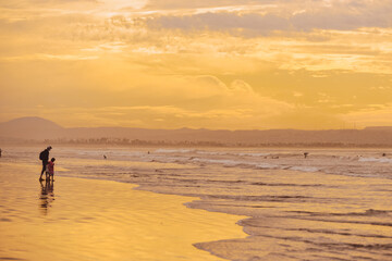 Fototapeta na wymiar Sunset Surfing in Southern California