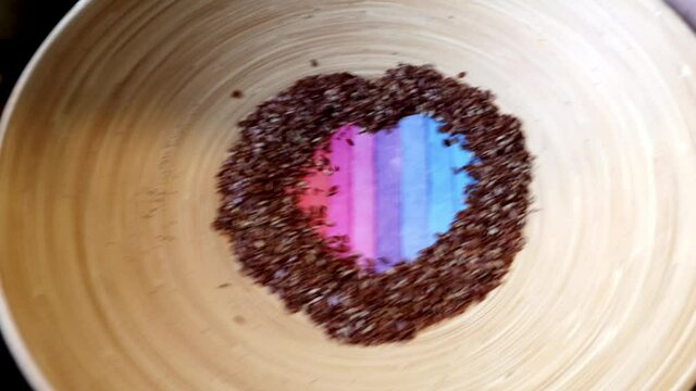 Valentine's Day heart made of sprinkled linseed in a tricky animation on valentinstag