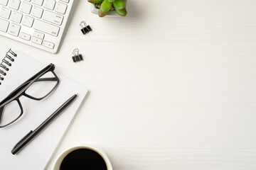 Flatlay view photo of flowerpot with green succulent pc items open spiral clear copybook cup of beverage isolated white wooden backdrop