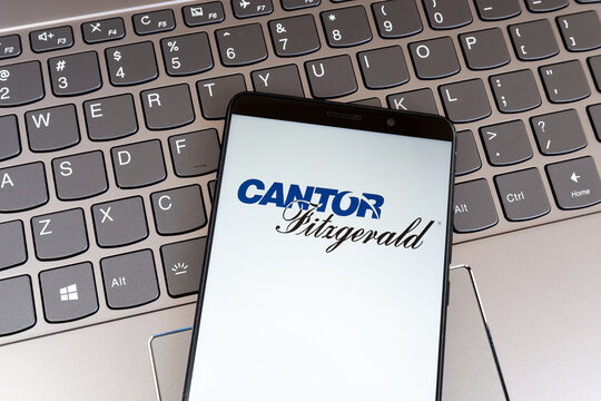 
Toronto, Canada - February 1, 2021: Cantor Fitzgerald logo on smartphone screen on keyboard. Cantor Fitzgerald is an American financial services firm. 
