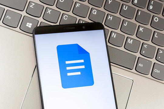 Toronto, Canada - February 4, 2021: Google docs logo on Smartphone screen on a laptop's keyboard. Google Docs is a word processor offered by Google. 