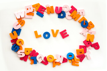Word made up of multicolored letters. Love