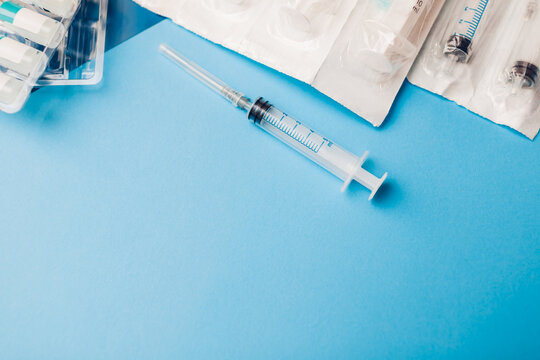 Covid-19 corona cirus 2019-ncov vaccine bottles with syringes. Vaccination, treatment of infection during pandemic.