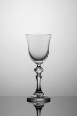 Glass shot glass on white background