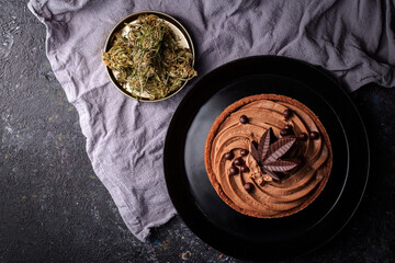Chocolate Cannabis Tart with marijuana leaf. Delicious infused dessert cake for special occasion, valentines day treat, Christmas, thanksgiving.