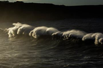 Fototapeta premium Huge waves hitting the cliff and exploding