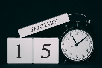 Important date and event on a black and white calendar. Cube date and month, day 15 January. Winter...