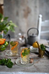 citrus tea with mint. Cup of tea with mint and lemon.