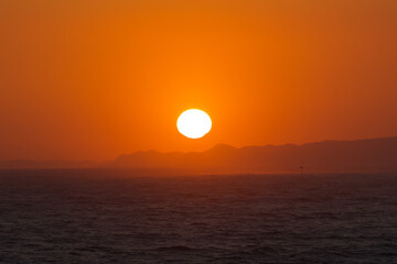 Japan Sunset along the Pacific Coast near Tokyo. The sky is stunning with many colors. Amazing.