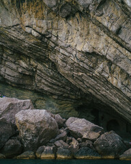 Beautiful patterned stones and cave entrance