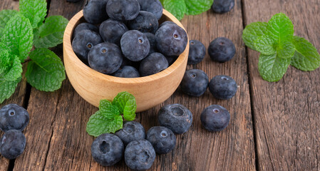 Fresh blueberry on wooden background