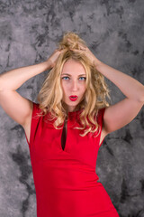 portrait of a young woman in a red dress