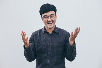 Fototapeta premium adult asian man.young male person wear eye glasses.posing smiling laughing look excited surprised thinking positive happy.empty,copy space for text advertising.white background.attractive fashion