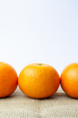 Orange on white background isolated, Asian tropical fruits whole good for healthy drinks and juice. Very natural sweet flavor. Tangerine, mandarine, Thai honey sweet green. Close up shot food concept