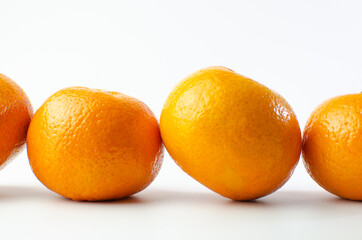 Orange on white background isolated, Asian tropical fruits whole good for healthy drinks and juice. Very natural sweet flavor. Tangerine, mandarine, Thai honey sweet green. Close up shot food concept