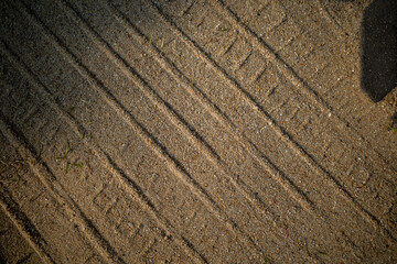 Tire Tracks in Dirt - Stock Photo