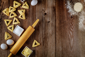 Baked hamantaschen jewish cookies with ingredients.