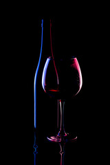 Still life with glass objects on a black background