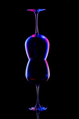 Still life with glass objects on a black background