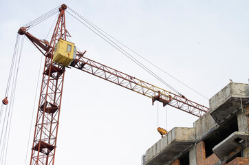 Fototapeta na wymiar construction crane construction of high-rise buildings