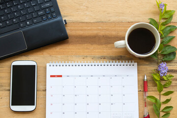 calendar planner ,mobile phone ,computer for business work arrangement flat lay style on background...