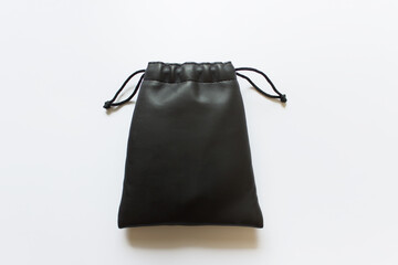Template of black fabric bag with drawstring on white background.
