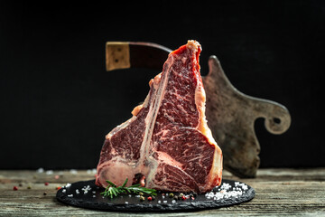 The T-bone or porterhouse steak of beef cut from the short loin. steak include T-shaped bone with...