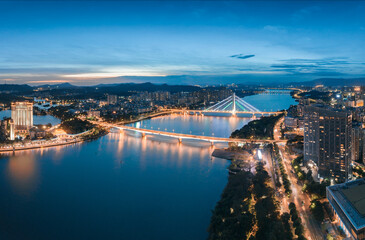 Fototapeta na wymiar Night view of Hesheng Bridge and Huizhou Bridge in Huizhou City, Guangdong Province, China