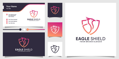 Eagle logo with creative shield concept and business card design template Premium Vector
