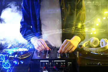 Naklejka na ściany i meble Female DJ mixing music in night club