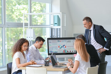 Businessman giving presentation in office