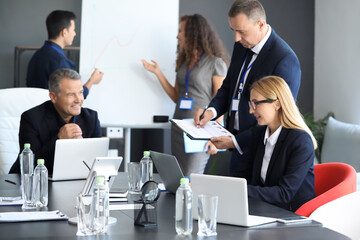 Team of business people during meeting in office