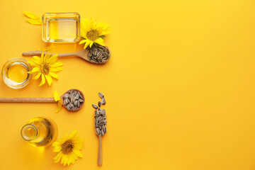 Composition with sunflower oil  and seeds on color background