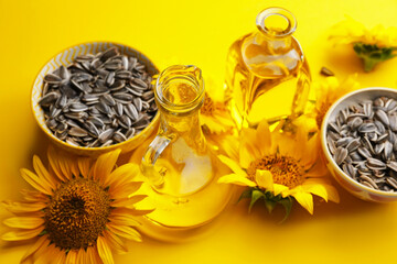 Composition with sunflower oil  and seeds on color background