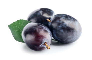 Tasty sweet plums on white background