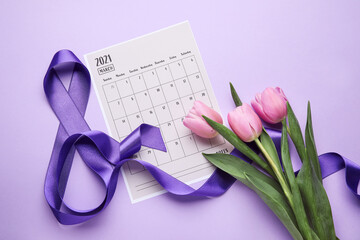 Calendar, flowers and violet ribbon on color background. International Women's Day celebration