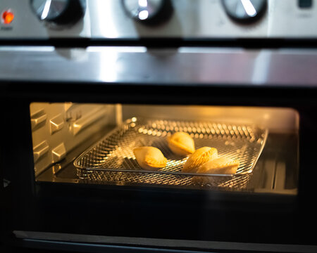 Air Fryer Oven Is Cooking Food In The Kitchen.