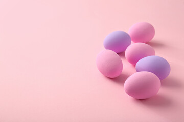 Beautiful Easter eggs on color background