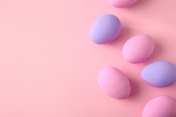 Beautiful Easter eggs on color background