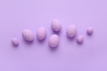 Beautiful Easter eggs on color background