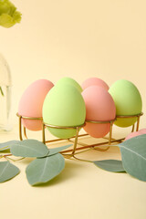 Beautiful Easter eggs on color background