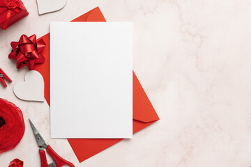 Greeting Card on Red Envelope Mockup With Copy Space