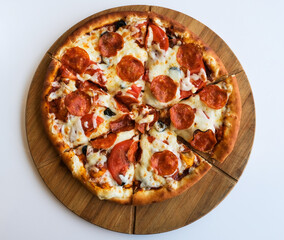 pepperoni pizza on a cutting board