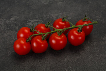 Ripe tomatoes on the branch