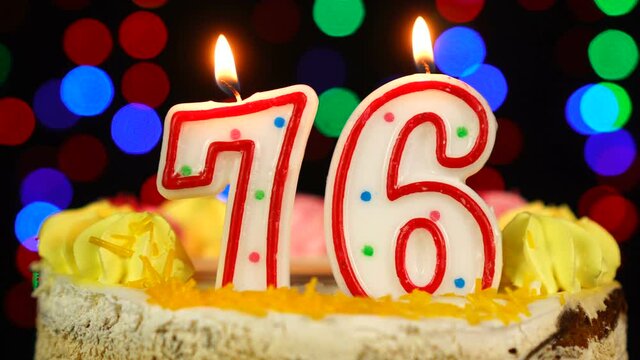 Number 76 Happy Birthday Cake With Burning Candles Topper.