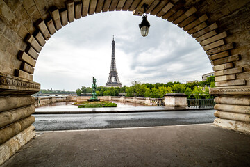 Eiffel Tower from the arch on the Bir-Hakim Bridge - Paris, France travel and tourism