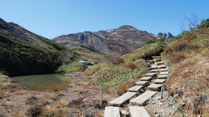 boardwalk beside pond at Hakuba, Japan, early autumn
